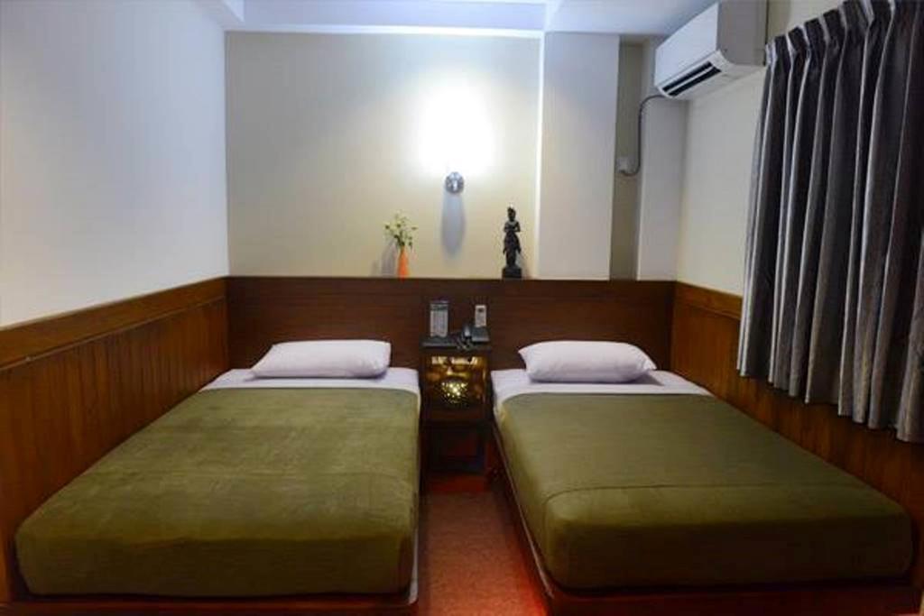 Green Paradise Hotel Yangón Habitación foto